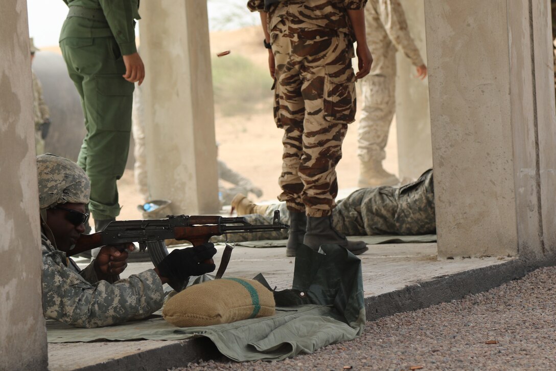 Spc. Antonio Hill a military policeman representing the 805th MP Company from Cary N.C., completes weapons training with Royal Moroccan Armed Forces during Exercise African Lion April 22, at Tifnit, Morocco. Exercise African Lion is an annually scheduled, combined multilateral exercise designed to improve interoperability and mutual understanding of each nation’s tactics, techniques and procedures.