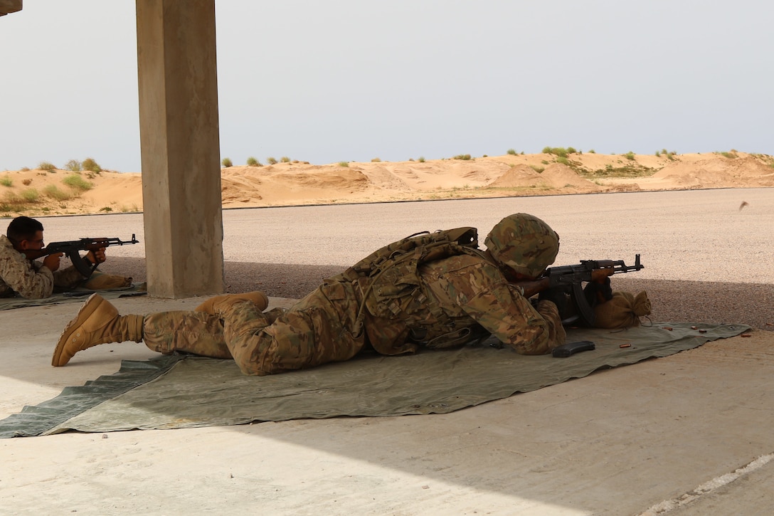 Staff Sgt. Jason Smith a military policeman representing the 805th MP Company from Cary N.C., completes weapons training with Royal Moroccan Armed Forces during Exercise African Lion April 22, at Tifnit, Morocco. Exercise African Lion is an annually scheduled, combined multilateral exercise designed to improve interoperability and mutual understanding of each nation’s tactics, techniques and procedures.
