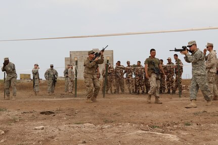 U.S. Soldiers representing the 805th Military Police Company, complete room clearing training during Exercise African Lion 17 April 24, at Tifnit, Morocco. By training together the U.S. military and Moroccan Army will further develop tactics, techniques, and procedures that promote interoperability between the two countries.