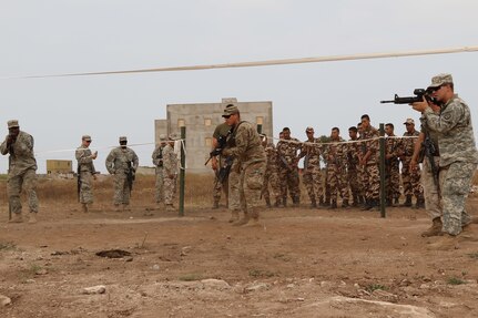 U.S. Soldiers representing the 805th Military Police Company, complete room clearing training during Exercise African Lion 17 April 24, at Tifnit, Morocco. By training together the U.S. military and Moroccan Army will further develop tactics, techniques, and procedures that enhance interoperability between the two militaries.