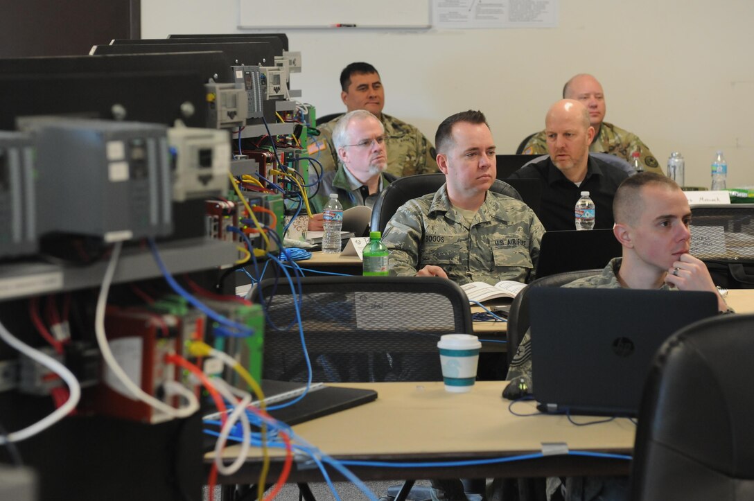 Members of the Army National Guard, Air National Guard, and U.S. Army Reserve, as well as civilians who work in law-enforcement, intelligence and information technologies, participate in the ISA CS34/CS37 62443 Cybersecurity Design Specialist/Maintenance Specialist course as part of Cyber Shield 17 at Camp Williams, Utah, April 28, 2017. Cyber Shield 17 is the sixth iteration of this training exercise and this year unites the Army National Guard with members of the Air National Guard, Army Reserve, and civilians from private companies, state government agencies, federal agencies, industry partners, and academia. (U.S. Army National Guard photo by Sgt. Michael Giles)