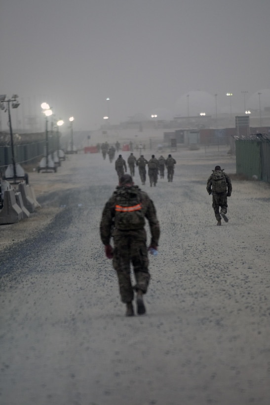 Soldiers ruck during the ruck-march portion of the German Armed Forces Badge qualification. The German Armed Forces Badge for Military Proficiency is one of the most sought after foreign awards in the United States Army. The 316th ESC and the 1st Sustainment Command (Theater) had the privilage of hosting the award qualifications at Camp Arifjan, Kuwait April 27, 2017.