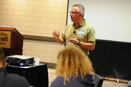 Chaplain (Maj.) Scott Hagen, deputy command chaplain for the 88th Regional Support Command, discusses a lesson from the Prevention and Relationship Enhancement Program (PREP) during a Strong Bonds event in suburban Minneapolis, April 21.