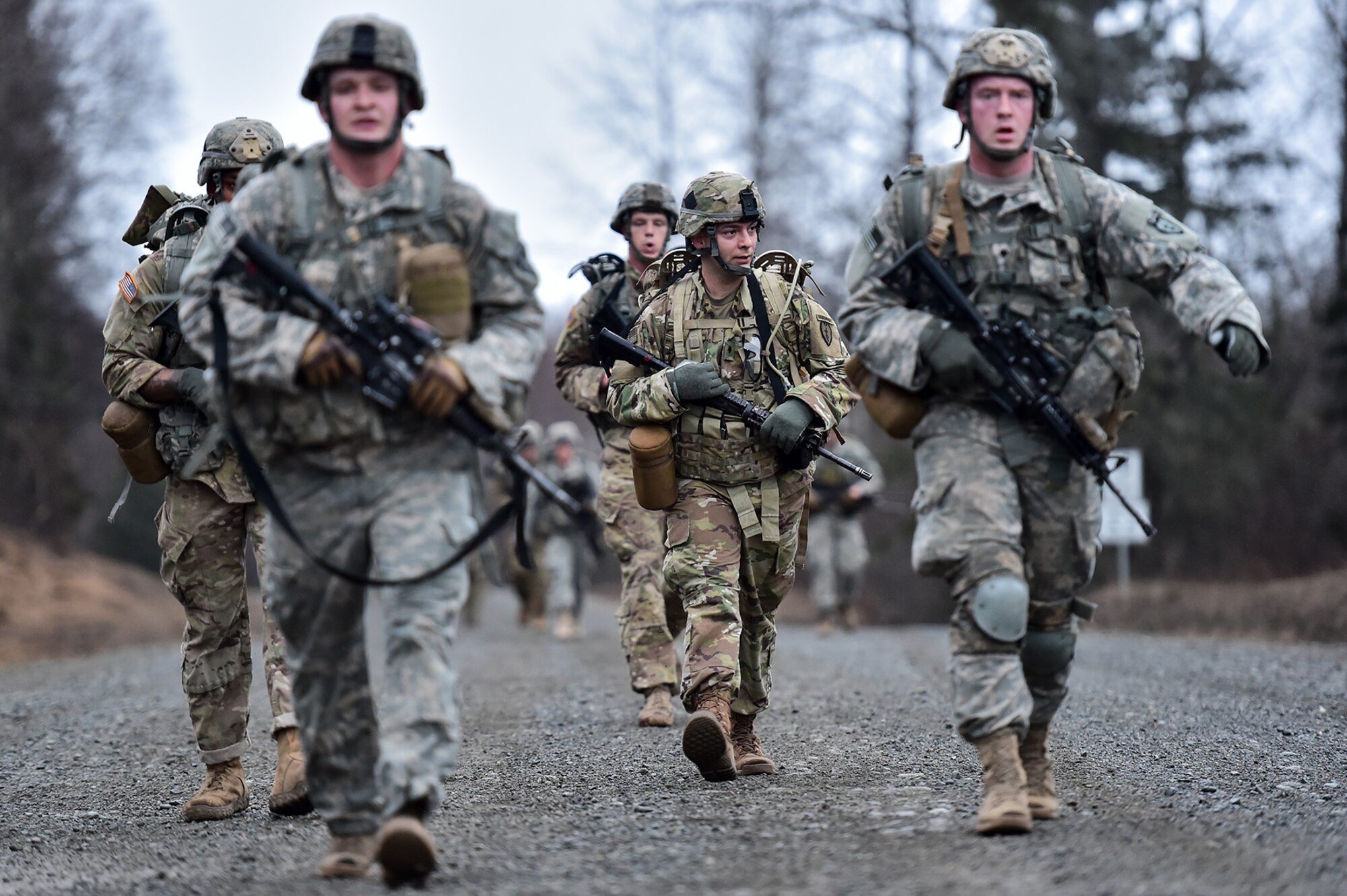 Soldiers assigned to Comanche Company, 1st Battalion, 501st Parachute Infantry Regiment, 4th Infantry Brigade Combat Team (Airborne), 25th Infantry Division, U.S. Army Alaska, execute a 12-mile tactical foot march on Joint Base Elmendorf-Richardson, Alaska, April 27, 2017. Foot marches are the movement of troops and equipment, mainly by foot, with limited support by vehicles. They are characterized by combat readiness, ease of control, adaptability to terrain, slow rate of movement, and increased personnel fatigue.
