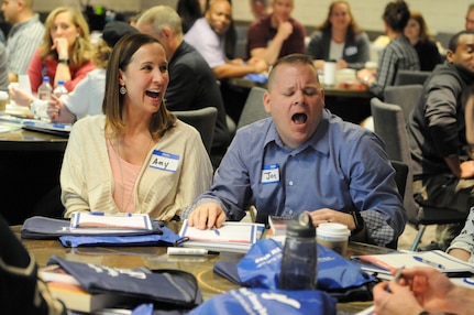 Jon Logan, right, a U.S. Army Reserve Soldier, and his wife Amy share a laugh during the Strong Bonds event in suburban Minneapolis, April 21. Strong Bonds is designed to increase individual Soldier and Family member readiness through relationship education and skills training.