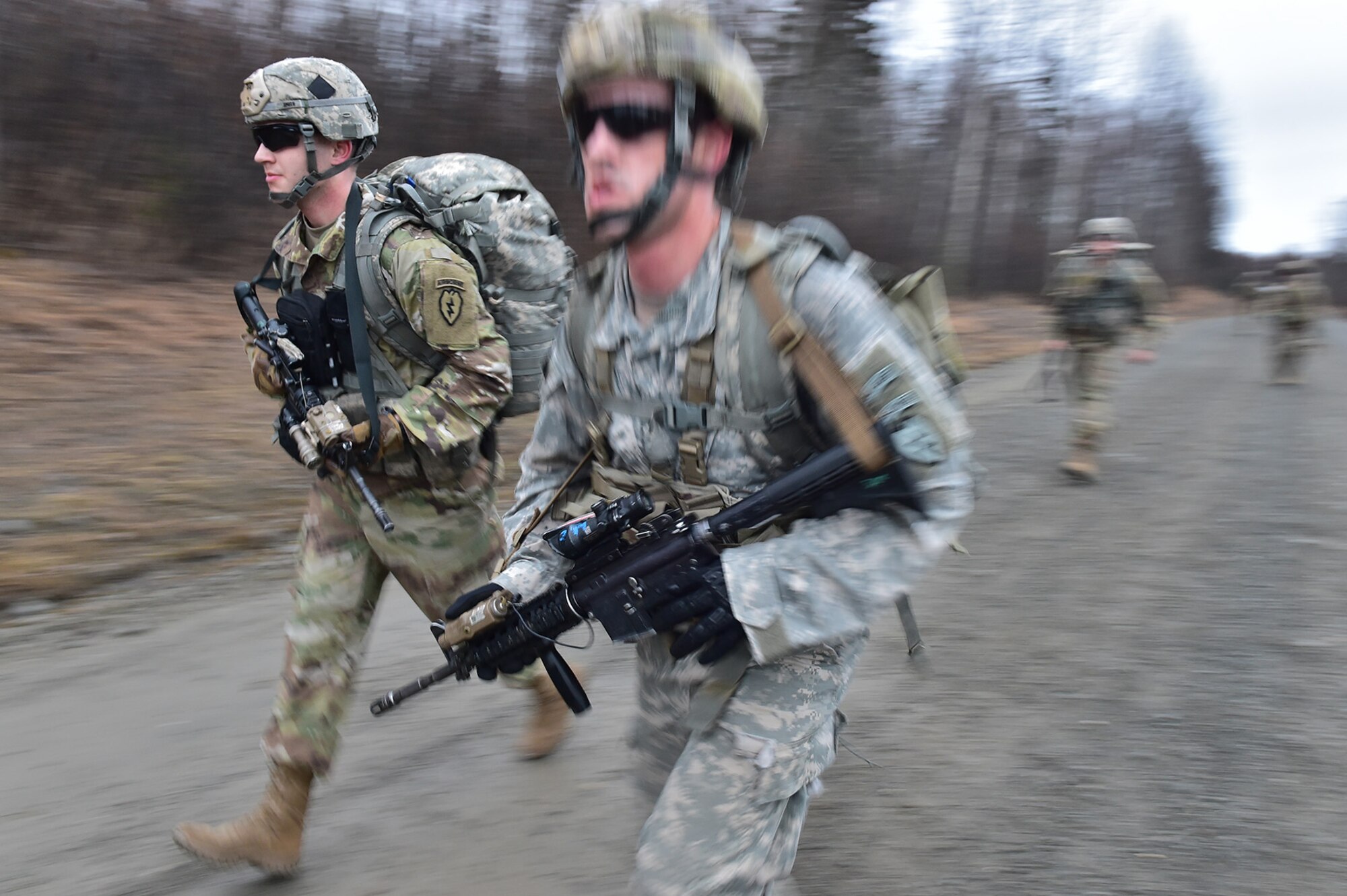Soldiers assigned to Comanche Company, 1st Battalion, 501st Parachute Infantry Regiment, 4th Infantry Brigade Combat Team (Airborne), 25th Infantry Division, U.S. Army Alaska, execute a 12-mile tactical foot march on Joint Base Elmendorf-Richardson, Alaska, April 27, 2017. Foot marches are the movement of troops and equipment, mainly by foot, with limited support by vehicles. They are characterized by combat readiness, ease of control, adaptability to terrain, slow rate of movement, and increased personnel fatigue.