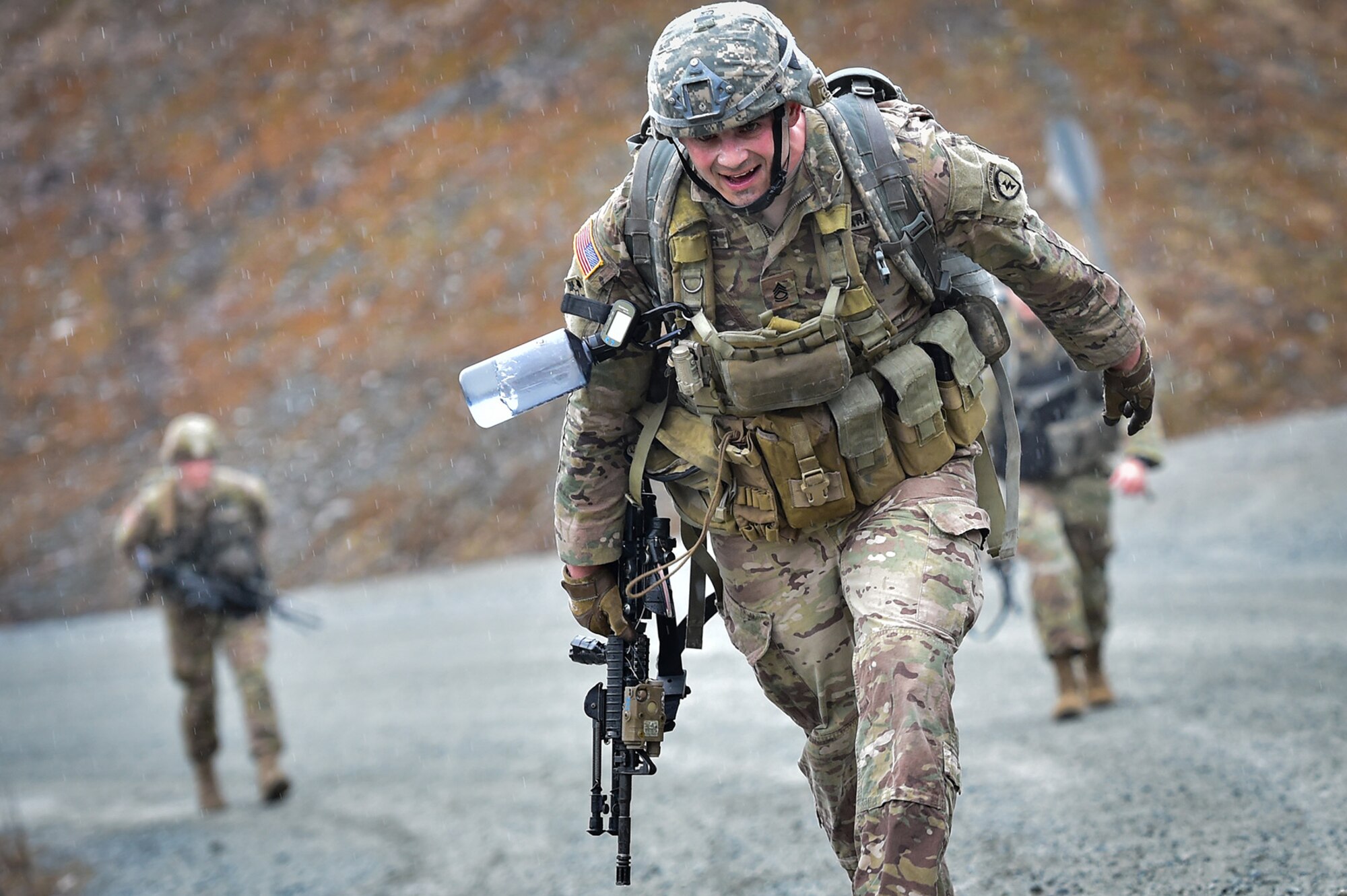Army Sgt. 1st Class Austin Fabacher, a native of Aurora, Colo., assigned to Comanche Company, 1st Battalion, 501st Parachute Infantry Regiment, 4th Infantry Brigade Combat Team (Airborne), 25th Infantry Division, U.S. Army Alaska, executes a 12-mile tactical foot march on Joint Base Elmendorf-Richardson, Alaska, April 27, 2017. Foot marches are the movement of troops and equipment, mainly by foot, with limited support by vehicles. They are characterized by combat readiness, ease of control, adaptability to terrain, slow rate of movement, and increased personnel fatigue.