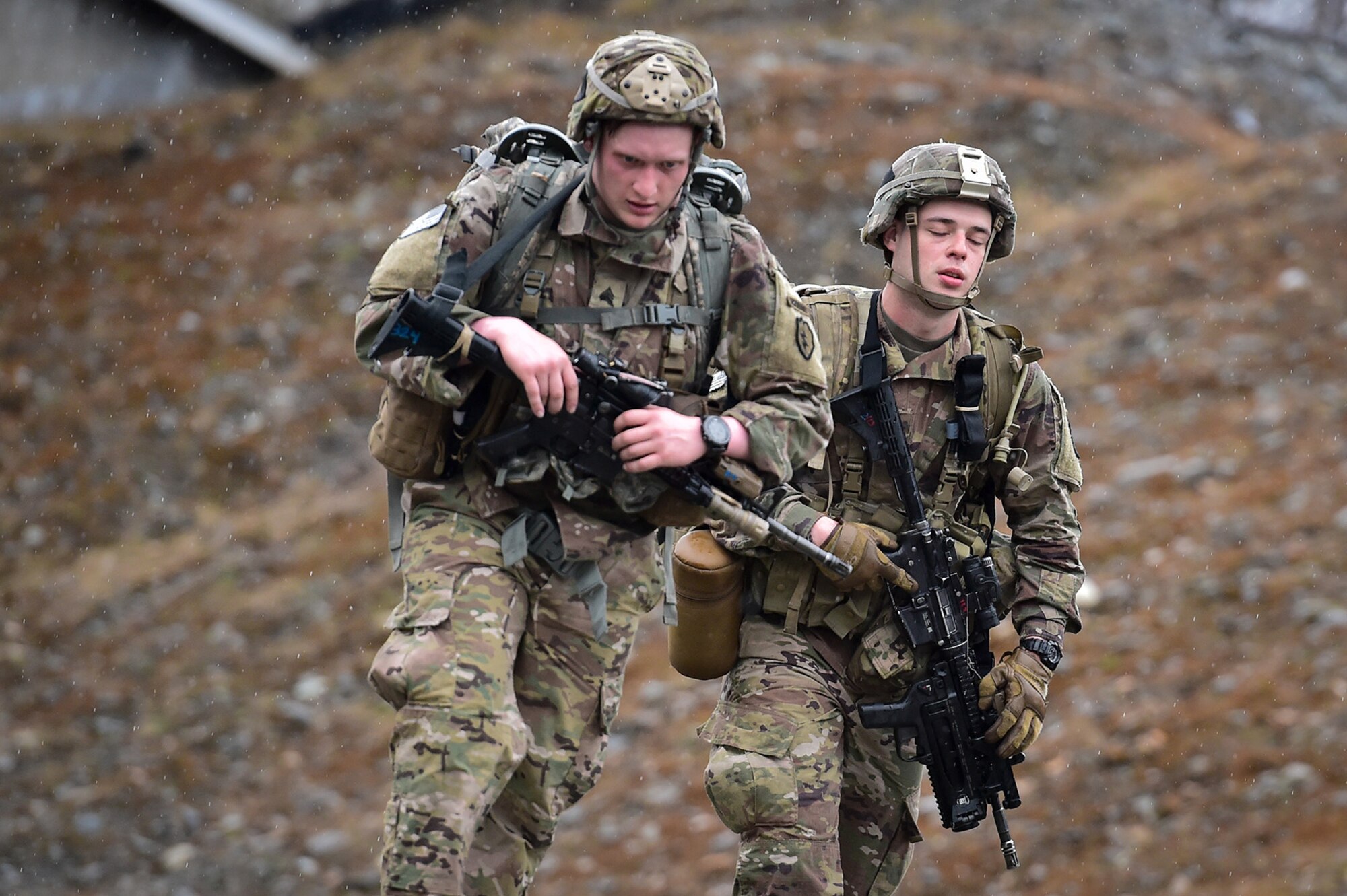 Soldiers assigned to Comanche Company, 1st Battalion, 501st Parachute Infantry Regiment, 4th Infantry Brigade Combat Team (Airborne), 25th Infantry Division, U.S. Army Alaska, execute a 12-mile tactical foot march on Joint Base Elmendorf-Richardson, Alaska, April 27, 2017. Foot marches are the movement of troops and equipment, mainly by foot, with limited support by vehicles. They are characterized by combat readiness, ease of control, adaptability to terrain, slow rate of movement, and increased personnel fatigue.