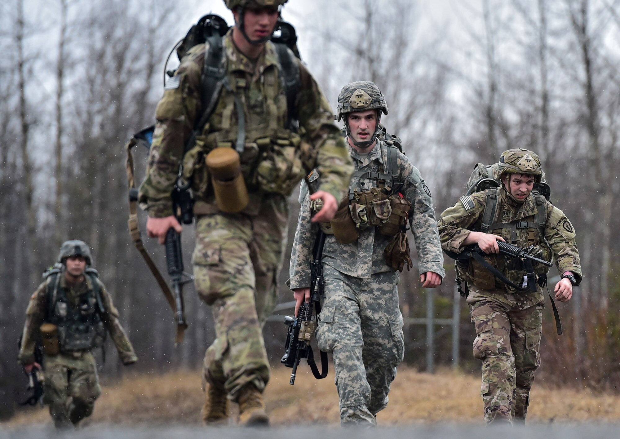 Soldiers assigned to Comanche Company, 1st Battalion, 501st Parachute Infantry Regiment, 4th Infantry Brigade Combat Team (Airborne), 25th Infantry Division, U.S. Army Alaska, execute a 12-mile tactical foot march on Joint Base Elmendorf-Richardson, Alaska, April 27, 2017. Foot marches are the movement of troops and equipment, mainly by foot, with limited support by vehicles. They are characterized by combat readiness, ease of control, adaptability to terrain, slow rate of movement, and increased personnel fatigue.