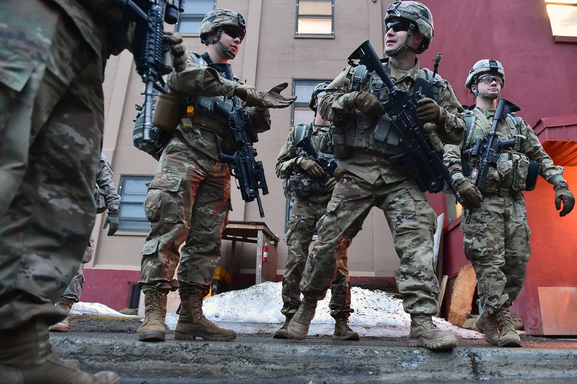 Soldiers assigned to Comanche Company, 1st Battalion, 501st Parachute Infantry Regiment, 4th Infantry Brigade Combat Team (Airborne), 25th Infantry Division, U.S. Army Alaska, wait for the order to begin a 12-mile tactical foot march on Joint Base Elmendorf-Richardson, Alaska, April 27, 2017. Foot marches are the movement of troops and equipment, mainly by foot, with limited support by vehicles. They are characterized by combat readiness, ease of control, adaptability to terrain, slow rate of movement, and increased personnel fatigue.
