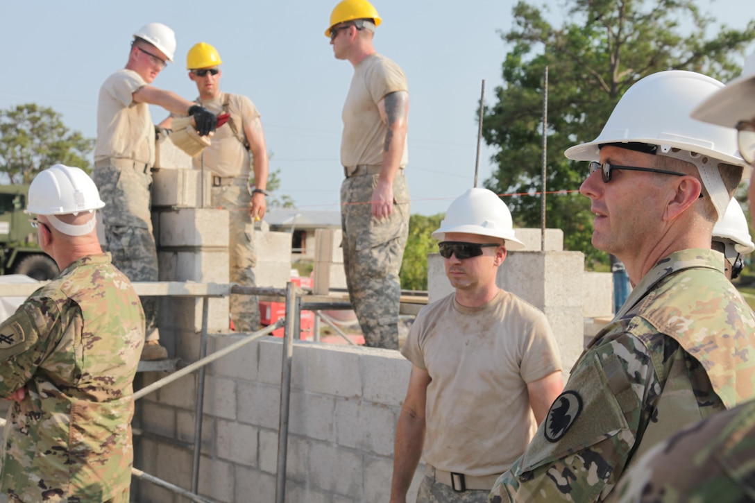 U.S. Army Maj. Gen. David Conboy, U.S. Army Reserves Deputy Commanding General (Operations), tours the Double Head Cabbage, Belize health clinic construction site being built by the 372nd Engineer Battalion, during Beyond the Horizon 2017, April 25, 2017. Beyond the Horizon is a U.S. Southern Command-sponsored, Army South-led exercise designed to provide humanitarian and engineering services to communities in need, demonstrating U.S. support for Belize. (U.S. Army photo by Spc. Gary Silverman)