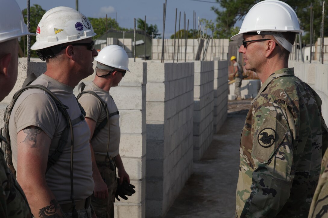 U.S. Army Maj. Gen. David Conboy, U.S. Army Reserves Deputy Commanding General (Operations), tours the Double Head Cabbage, Belize health clinic construction site being built by the 372nd Engineer Battalion, during Beyond the Horizon 2017, April 25, 2017. Beyond the Horizon is a U.S. Southern Command-sponsored, Army South-led exercise designed to provide humanitarian and engineering services to communities in need, demonstrating U.S. support for Belize. (U.S. Army photo by Spc. Gary Silverman)