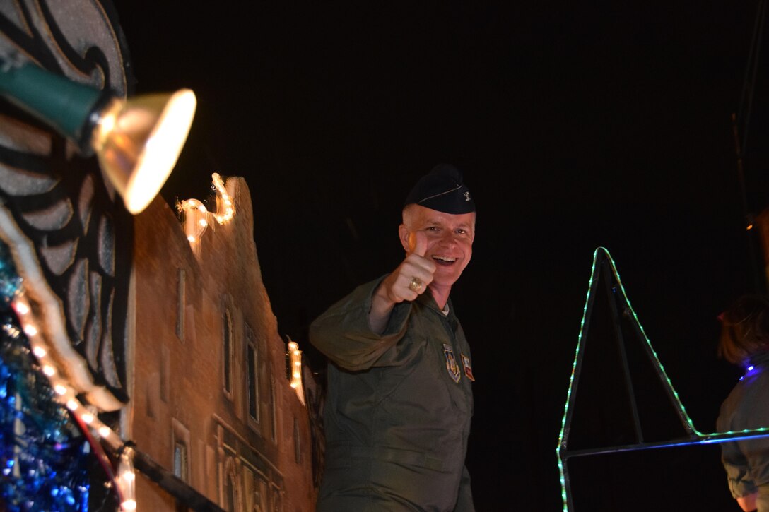 Col. David A. Scott, 433rd Airlift Wing vice commander,  gives a thumbs-up during the 69th annual Fiesta Flambeau Parade, April 29, 2017. Over 700,000 spectators lined the 2.6 mile long route on the downtown streets of San Antonio to see over 200 floats and marching bands perform in the grand finale of Fiesta Week. (U.S. Air Force Photo/ Tech. Sgt. Carlos J. Trevino)