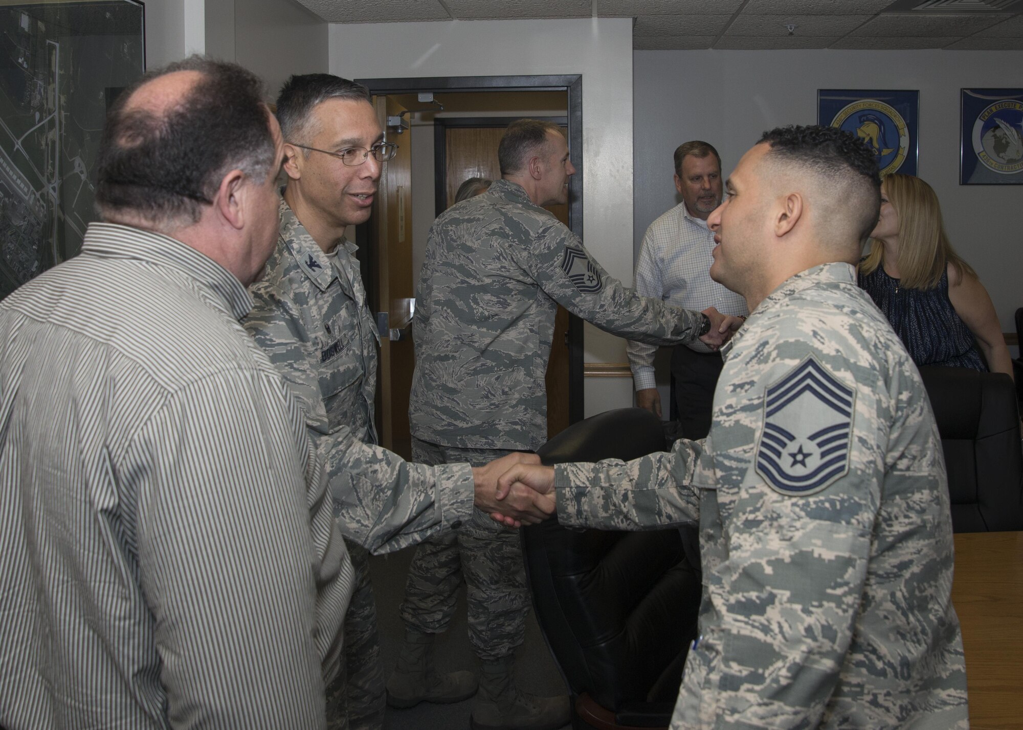 Col. Randy Boswell, 436th Mission Support Group commander, meets with Chief Master Sgt. Luis Reyes, Senior Enlisted Advisor for the Army & Air Force Exchange Service, April 27, 2017, at Dover Air Force Base, Del. Reyes met with Boswell and other 436th MSG leadership to better understand the needs of the Airmen. (U.S. Air Force photo by Staff Sgt. Jared Duhon)