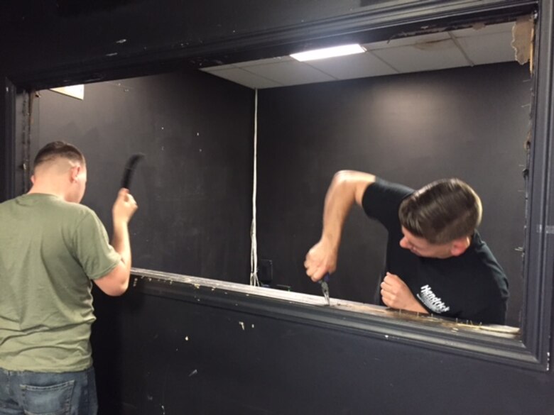 Marines paint walls during the construction of a Boys & Girls Club in New Bern, N.C., April 24, 2017. Marines assigned to Marine Wing Support Squadron 272, Marine Aircraft Group 26, 2nd Marine Aircraft Wing traveled from their duty station at Marine Corps Air Station New River to roll up their sleeves and strip the remains of an old nightclub. They cleared rooms, repainted wall and moved furniture while growing closer to the local volunteers and as a unit. (Courtesy photo)