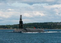 The Gold Crew of the Ohio-class ballistic-missile submarine USS Alabama (SSBN 731) transits the Hood Canal April 28, 2017, as the boat returns home to Naval Base Kitsap-Bangor following a routine strategic deterrent patrol. Alabama is one of eight ballistic-missile submarines stationed at the base, providing the most survivable leg of the strategic deterrence triad for the United States. 