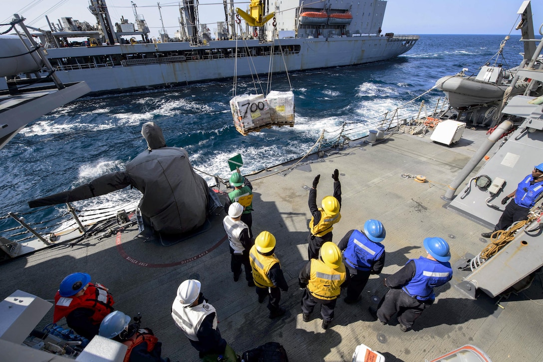 Sailors aboard the guided-missile destroyer USS Fitzgerald conduct a replenishment at sea with the fleet replenishment oiler USNS Pecos in the Sea of Japan, April 27, 2017. The Fitzgerald is on patrol in the U.S. 7th Fleet area of operations supporting security and stability in the Indo-Asia-Pacific region. Navy photo by Petty Officer 2nd Class William McCann