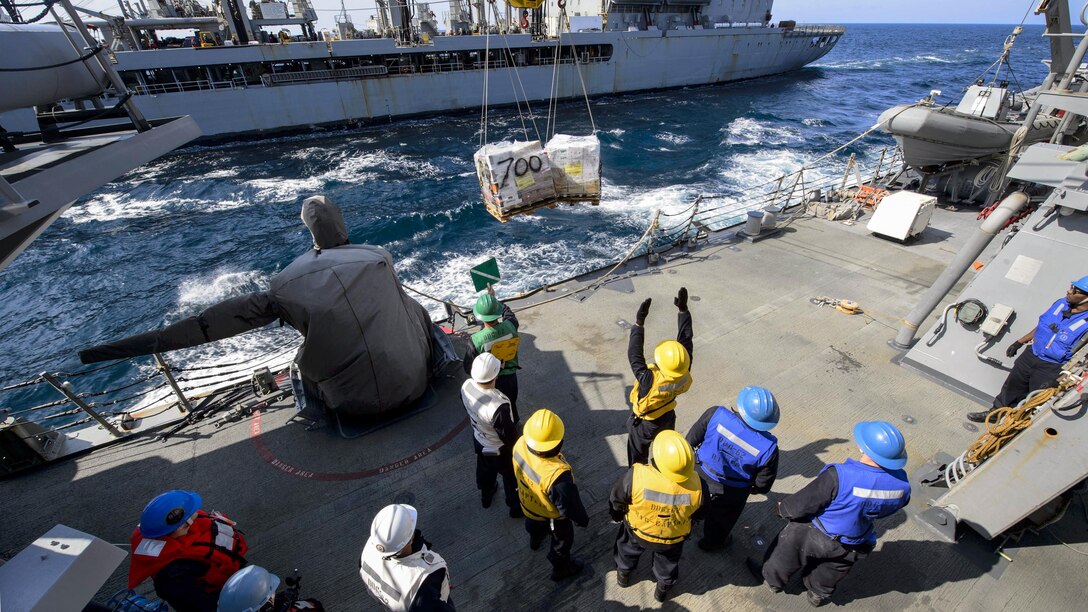 Sailors aboard the guided-missile destroyer USS Fitzgerald conduct a replenishment at sea with the fleet replenishment oiler USNS Pecos in the Sea of Japan, April 27, 2017. The Fitzgerald is on patrol in the U.S. 7th Fleet area of operations supporting security and stability in the Indo-Asia-Pacific region. Navy photo by Petty Officer 2nd Class William McCann