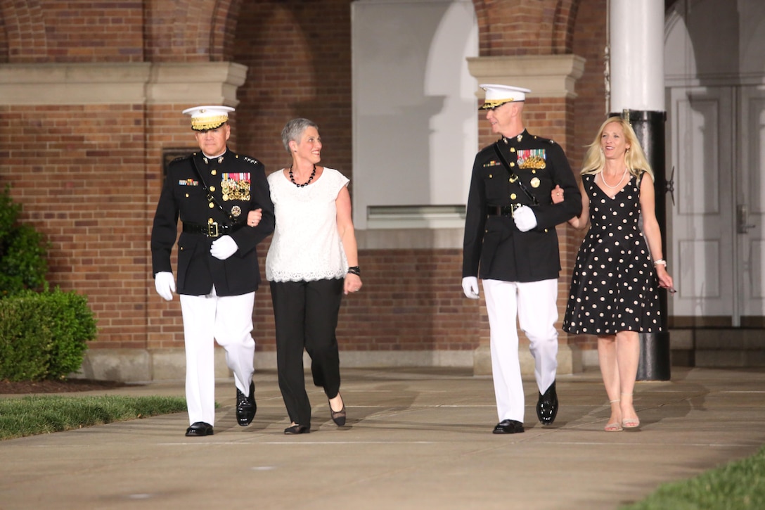 Commandant of the Marine Corps Gen. Robert B. Neller, and Marine Barracks Washington Commanding Officer, Col. Tyler J. Zagurski, salute during  the pass in review at the Friends and Family Evening Parade at the Barracks, Apr. 28, 2017. The guest of honor for the parade was the Commandant of the Marine Corps Gen. Robert B. Neller and the hosting official was the Barracks’ commanding officer, Col. Tyler J. Zagurski.