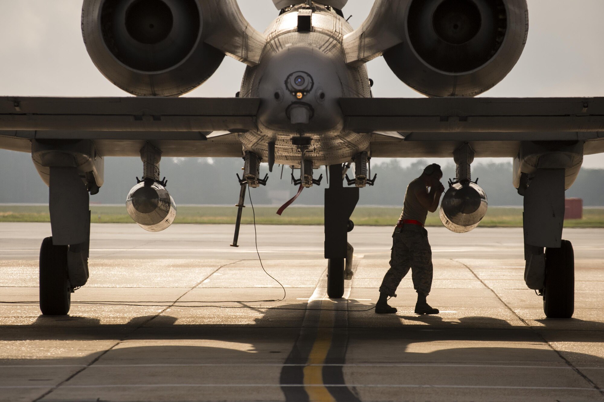 A crew chief from the 75th Aircraft Maintence Unit secures a travel pod during a pre-flight inspection on an A-10C Thunderbolt II, April 28, 2017 at Moody Air Force Base. The 75th FS departed for Combat Hammer, an air-to-ground exercise hosted at Hill Air Force Base, Utah. The exercise is designed to collect and analyze data on the performance of precision weapons and measure their suitability for use in combat. (U.S. Air Force photo by Andrea Jenkins)