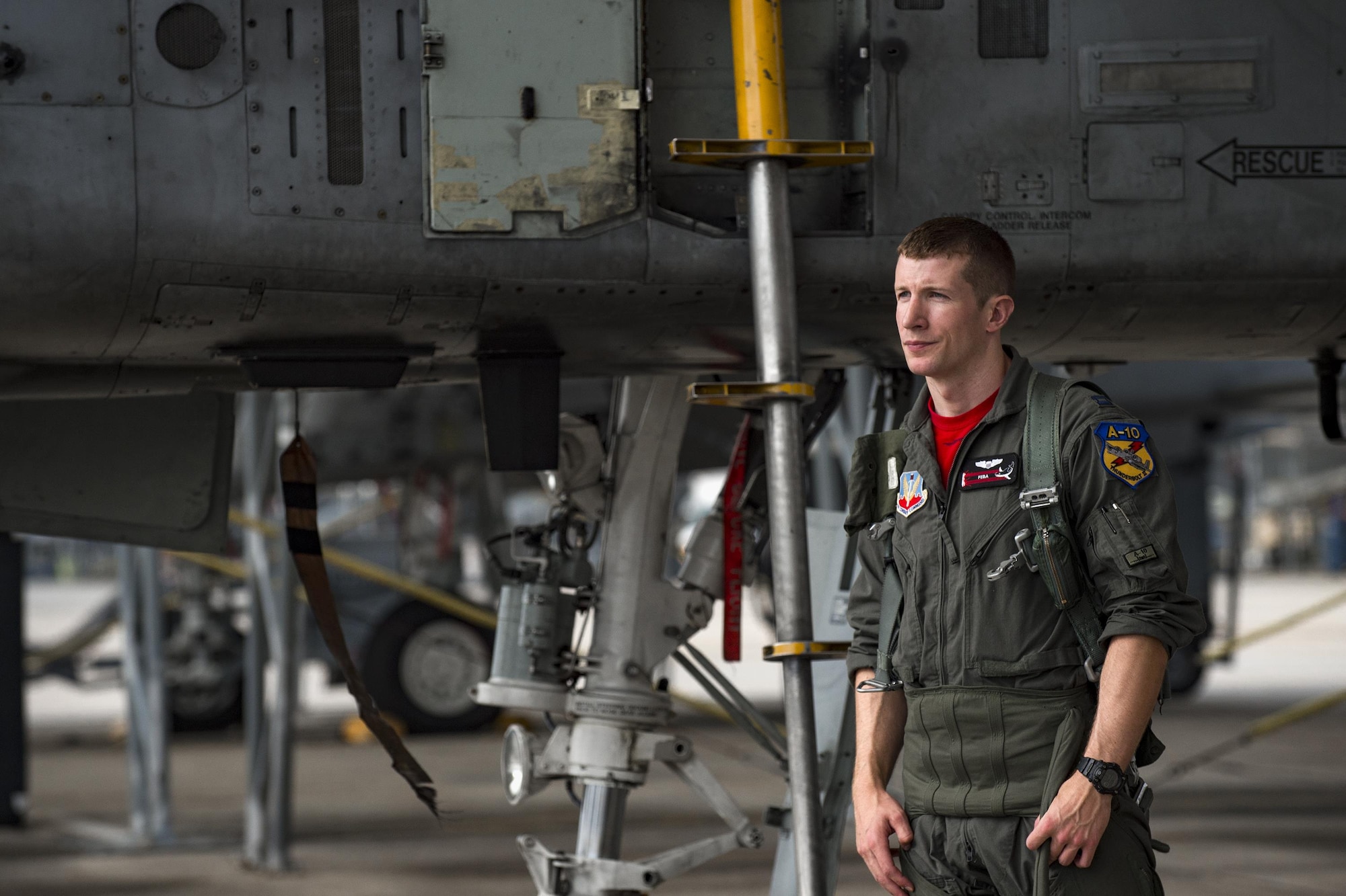 An A-10C Thunderbolt II pilot from the 75th Fighter Squadron stands near his aircraft prior to take off, April 28, 2017, at Moody Air Force Base, Ga. The 75th FS departed for Combat Hammer, an air-to-ground exercise hosted at Hill Air Force Base, Utah. The exercise is designed to collect and analyze data on the performance of precision weapons and measure their suitability for use in combat. (U.S. Air Force photo by Andrea Jenkins)