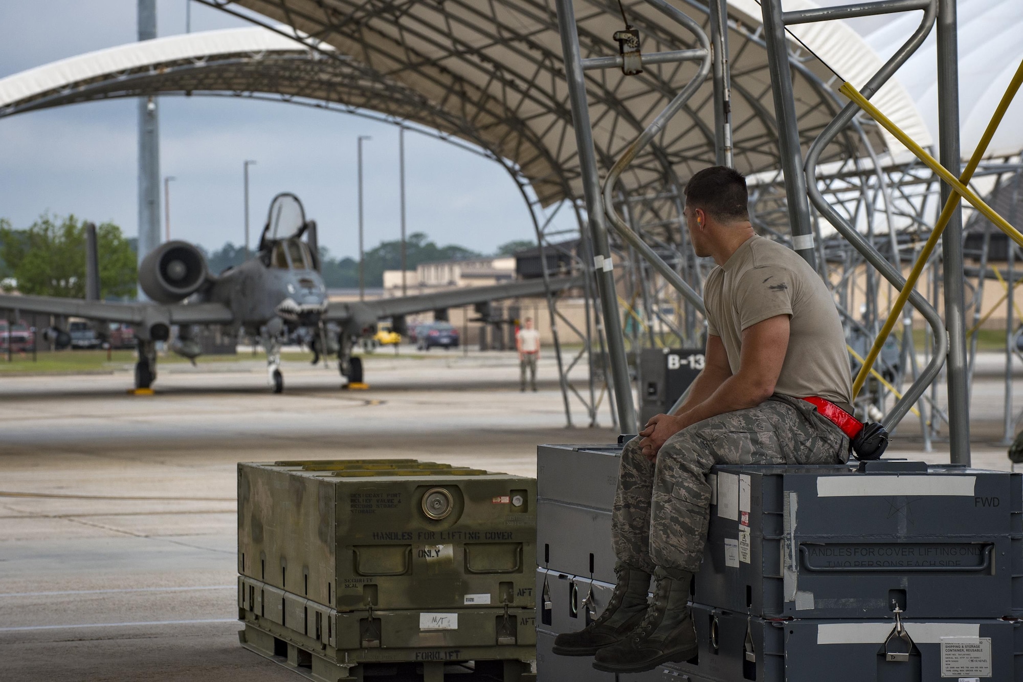 A crew chief from the 75th Aircraft Maintence Unit watches a fellow crew chief prepare to launch an A-10C Thunderbolt II, April 28, 2017 at Moody Air Force Base. The 75th FS departed for Combat Hammer, an air-to-ground exercise hosted at Hill Air Force Base, Utah. The exercise is designed to collect and analyze data on the performance of precision weapons and measure their suitability for use in combat. (U.S. Air Force photo by Andrea Jenkins)