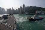 A harbor tug guides the Arleigh Burke-class guided-missile destroyer USS Sterett (DDG 104) as the ship prepares to moor in Hong Kong for a scheduled port visit, April 29, 2017. Sterett is part of the Sterett-Dewey Surface Action Group and is the third deploying group operating under the command and control construct called 3rd Fleet Forward. U.S. 3rd Fleet operating forward offers additional options to the Pacific Fleet commander by leveraging the capabilities of 3rd and 7th Fleets.