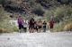 March of the Fallen participants hike through White Tank Mountain Regional Park April 29, 2017 in Waddell, Ariz.  The MOTF is a 4.5-mile rucksack march dedicated to honoring those who gave their lives during Operation Enduring Freedom, Operation Iraqi Freedom and Operation New Dawn.(U.S. Air Force photo by Devante Williams)