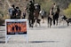 March of the Fallen pass mile three marker during the ruck march through White Tank Mountain Regional Park April 29, 2017 in Waddell, Ariz.  Proceeds from the even benefit the Wounded Warrior Project and Luke Airmen’s Fund. (U.S. Air Force photo by Devante Williams)