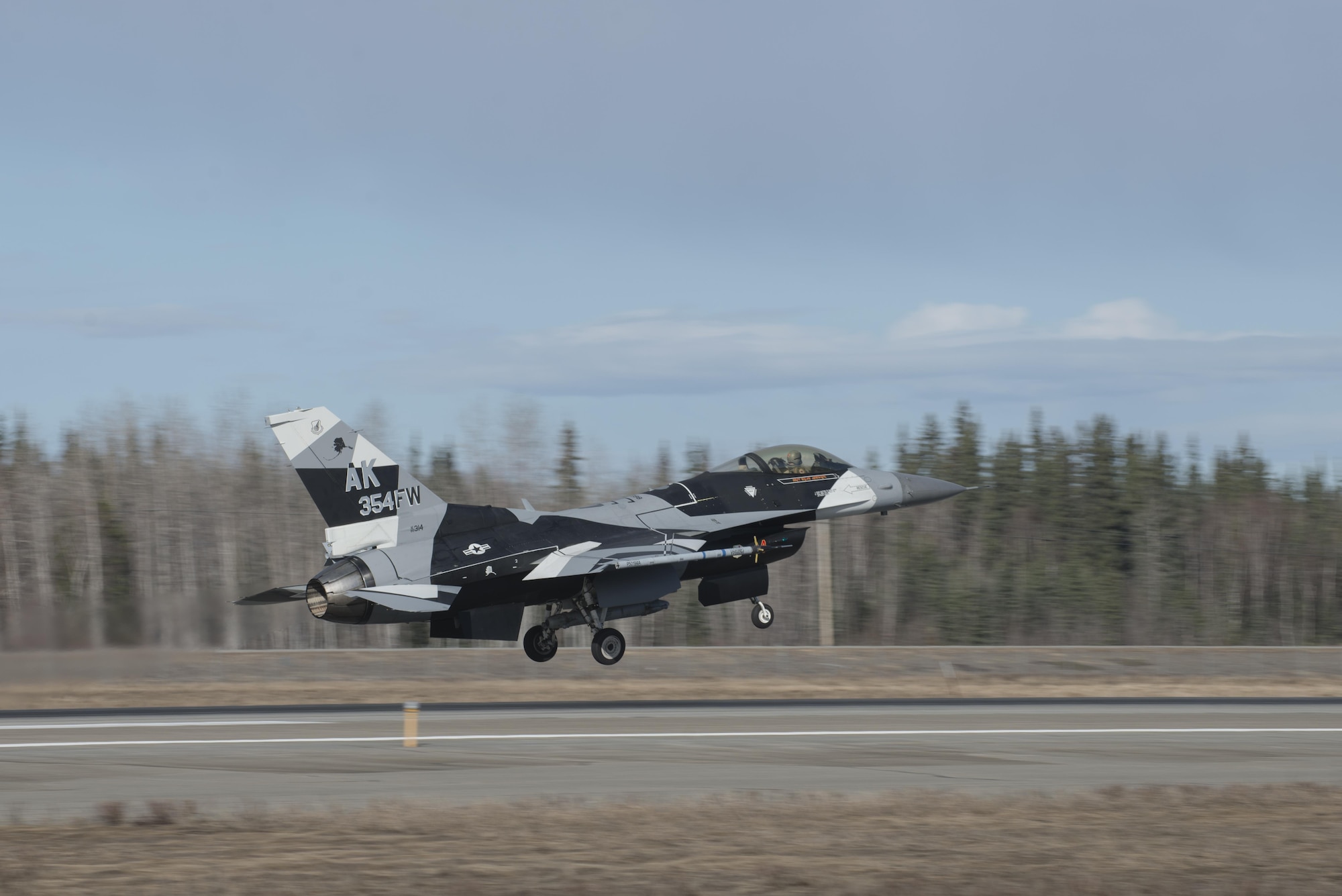 EIELSON AIR FORCE BASE, Alaska – A U.S. Air Force F-16 Fighting Falcon aircraft assigned to the 18th Aggressor Squadron takes off for a sortie from Eielson Air Force Base, Alaska, May 1, 2017 during NORTHERN EDGE 2017 (NE17). NE17 is Alaska’s premier joint training exercise designed to practice operations, techniques and procedures as well as enhance interoperability among the services. Thousands of participants from all the services, Airmen, Soldiers, Sailors, Marines and Coast Guardsmen from active duty, Reserve and National Guard units are involved. (U.S. Air Force photo/Staff Sgt. Ashley Nicole Taylor)