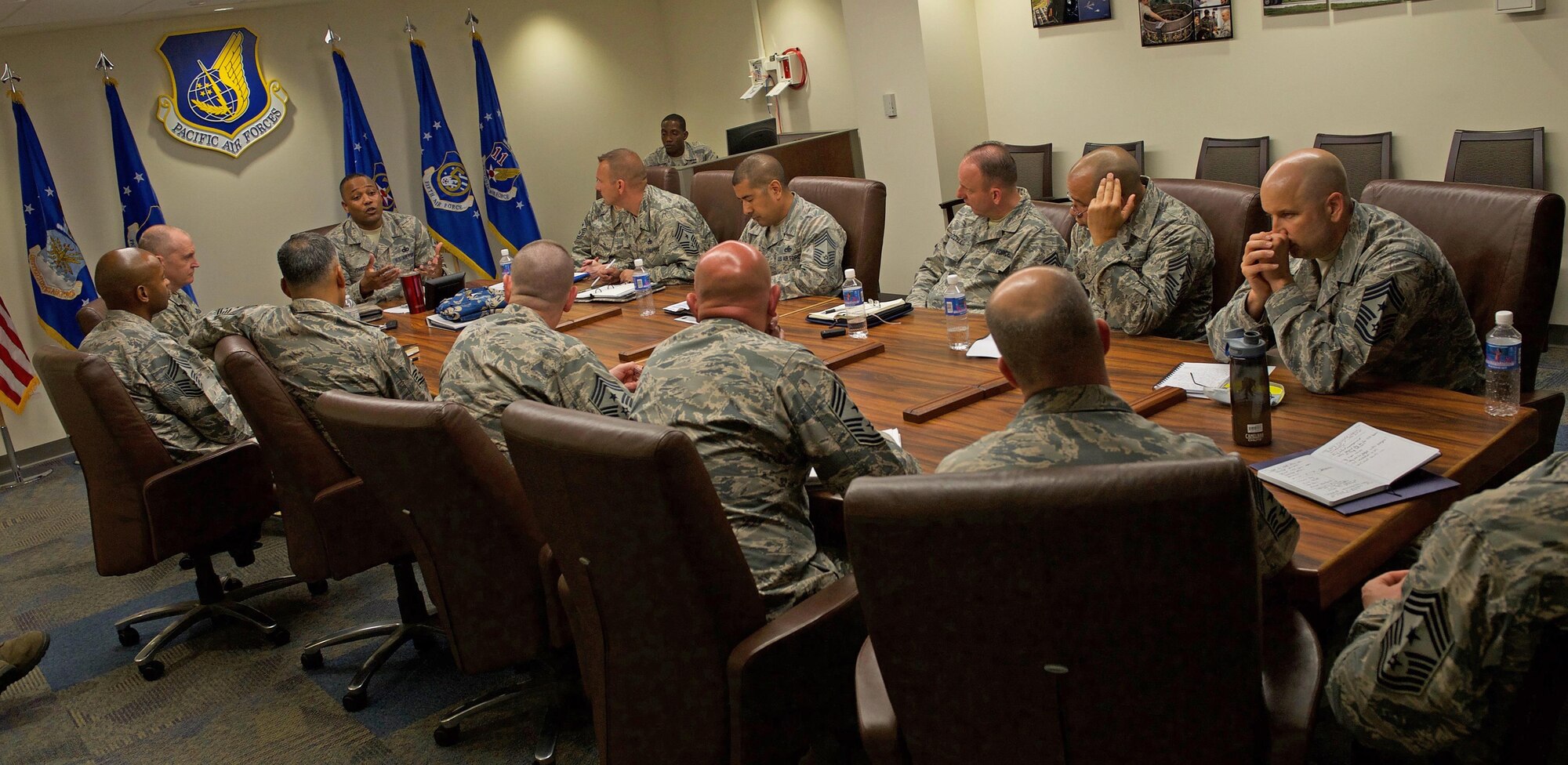 U.S. Air Force Chief Master Sgt. Anthony Johnson, Pacific Air Forces (PACAF) command chief, talks about enlisted issues with command chiefs from the PACAF area of responsibility during the spring Commander's Conference at Joint Base Pearl Harbor-Hickam, Hawaii April 26, 2017. The goal for the conference is to continue developing the warfighter and preparing PACAF leaders to remain poised to retain the competitive advantage in this evolving theater of operations. (U.S. Air Force photo by Tech. Sgt. Kamaile Chan)