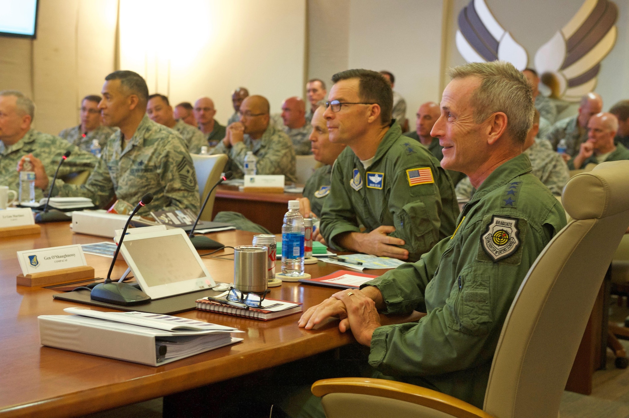U.S. Air Force Gen. Terrence J. O'Shaughnessy (right), Pacific Air Forces (PACAF) commander and Maj. Gen. Mark Dillon (center), PACAF vice commander, listen to briefings during the spring Commander's Conference at Joint Base Pearl Harbor-Hickam, Hawaii April 25, 2017. The goal for the conference is to continue developing the warfighter and preparing PACAF leaders to remain poised to retain the competitive advantage in this evolving theater of operations. (U.S. Air Force photo by Tech. Sgt. Kamaile Chan)
