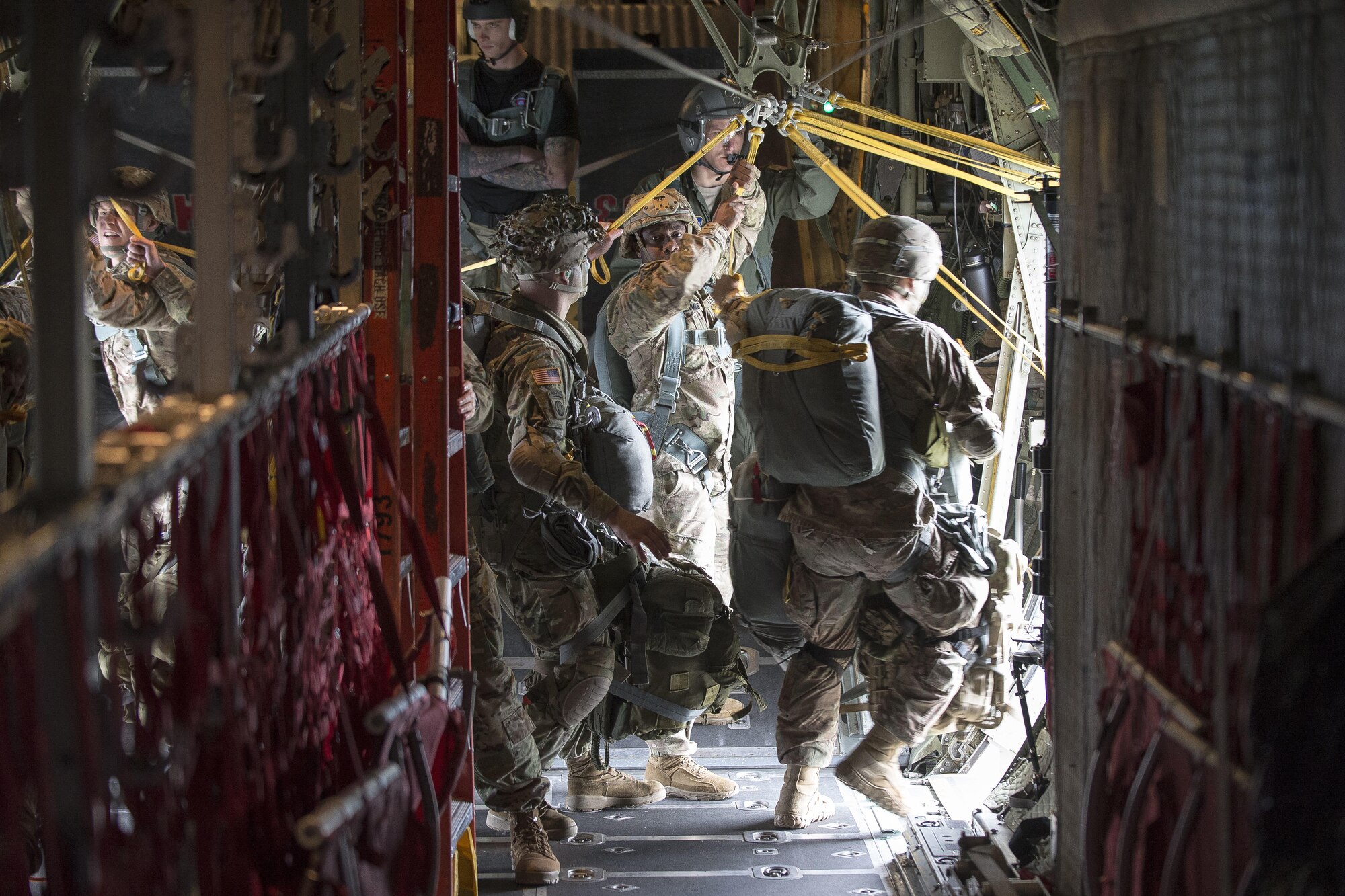 Soldiers parachute from a C-130H Hercules aircraft over the Czech Republic during Exercise Saber Junction 17, April 27, 2017. The exercise is designed to assess the readiness of the Army’s Stryker-based 2nd Cavalry Regiment to conduct unified land operations, with a particular emphasis on rehearsing the transition from garrison to combat operations, and exercising operational and tactical decision-making. The U.S. soldiers are assigned to the 173rd Airborne Brigade, 2nd Battalion, 503rd Infantry Regiment. Air Force photo by Senior Airman Cory W. Bush