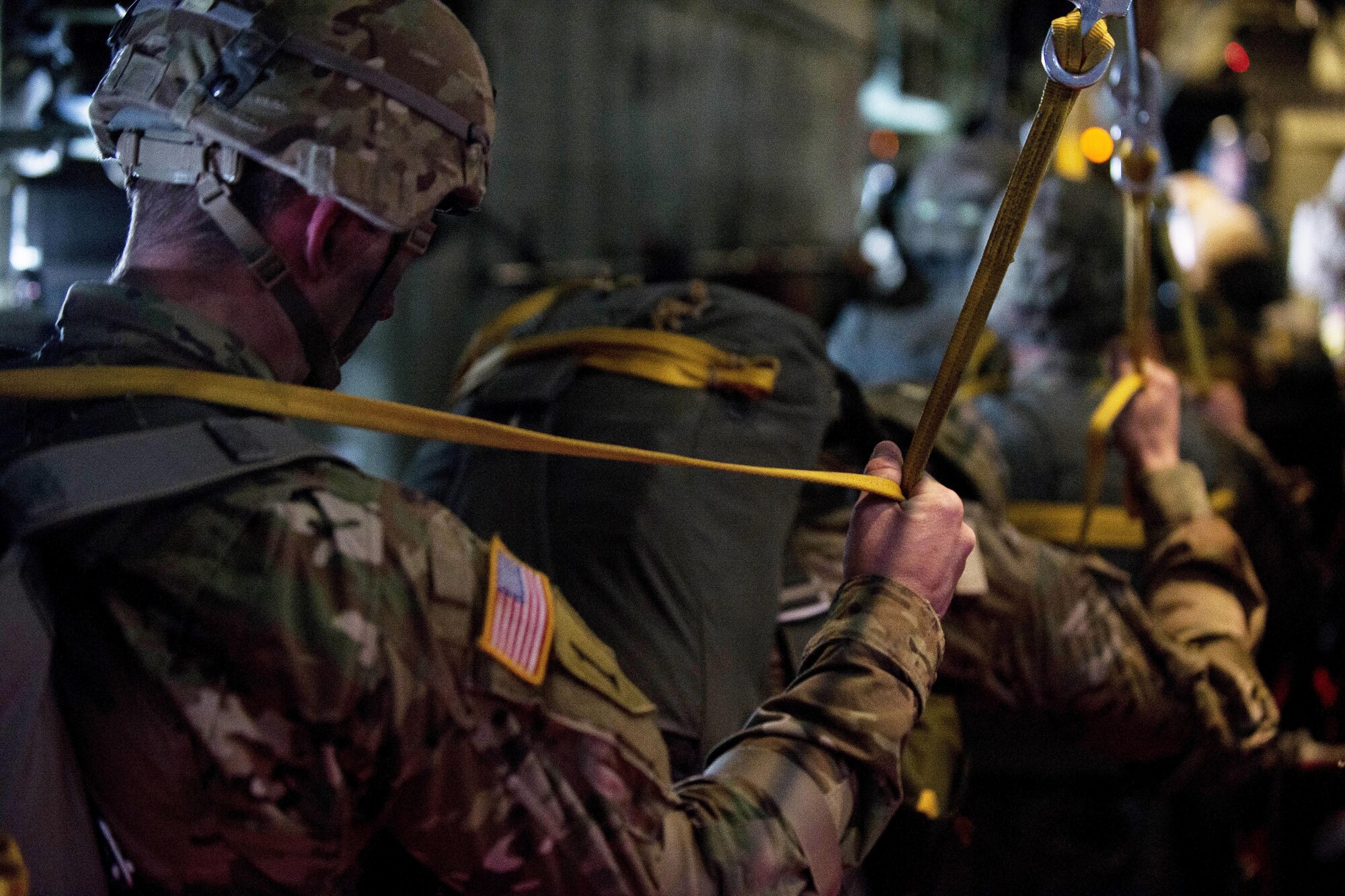 U.S. and Czech paratroopers prepare to jump over the Czech Republic during Exercise Saber Junction 17, April 27, 2017. The soldiers departed Aviano Air Base, Italy, to perform joint field exercise training in Mimon, Czech Republic. Air Force photo by Senior Airman Cory W. Bush