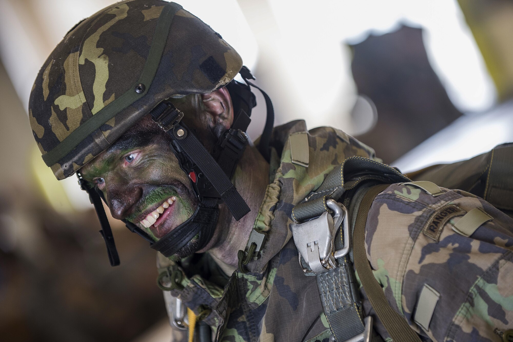 A Czech army paratrooper participates in Exercise Saber Junction 17 on Aviano Air Base, Italy, April 27, 2017. U.S. and Czech paratroopers conducted joint airborne operations and an airfield seizure exercise in Mimon, Czech Republic. Air Force photo by Senior Airman Cory W. Bush