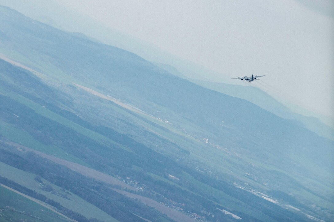 A C-130H Hercules aircraft from the Missouri Air National Guard’s 139th Airlift Wing transports U.S. and Czech paratroopers to Mimon, Czech Republic, during Exercise Saber Junction 17, April 27, 2017. Roughly 1,000 participants from eight NATO and four partner nations are participating in the exercise. Air Force photo by Senior Airman Cory W. Bush