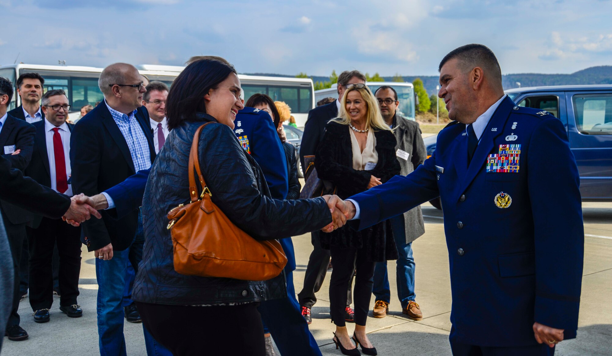 Col. Michael Roberts, 86th Medical Group deputy commander, greets civilian medical providers from the Kaiserslautern Military Community during a tour on Ramstein Air Base, Germany, April 27, 2017. The biennial tour aims to maintain and increase the partnership between military and local civilian medical providers. (U.S. Air Force photo/Staff Sgt. Timothy Moore)