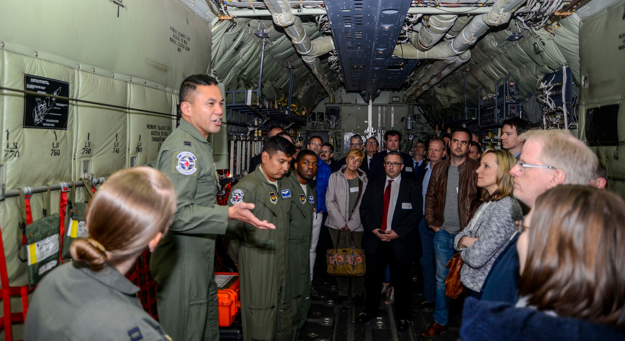 Capt. Randolph Matias, 86th Aeromedical Evacuation Squadron flight nurse, briefs medical providers during a tour on Ramstein Air Base, Germany, April 27, 2017. The biennial tour helps medical providers from the Kaiserslautern Military Community see how the care they provide to military members and their families plays not only into the 86th AES mission, but the overall 86th Medical Group mission. (U.S. Air Force photo/Staff Sgt. Timothy Moore)