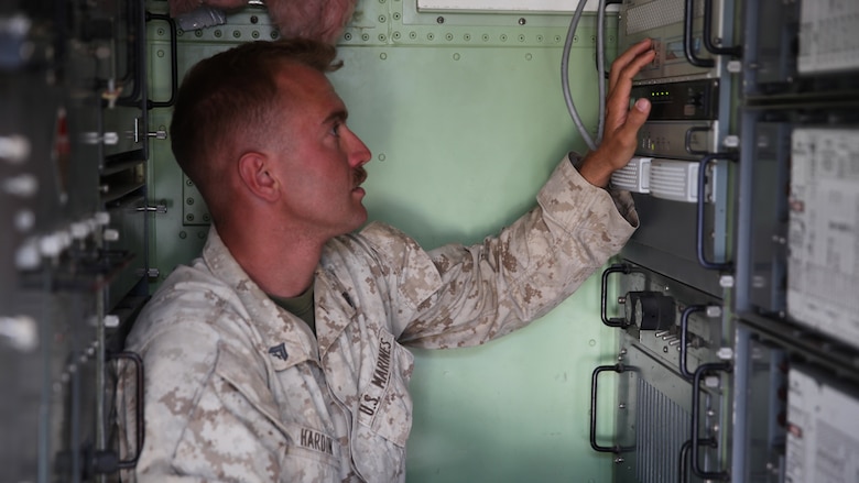 Cpl. Austin Hardin verifies the frequency on the Tropospheric Scatter Microwave Radio Terminal, or the AN/TRC-170, during the Weapons and Tactics Instructor Course near Marine Corps Air Station Yuma, Ariz., April 26, 2017. The AN/TRC-170 is used to transfer data, internet, phone, and email from one place to another within 100 nautical miles. Hardin is AN/TRC-170 operator assigned to Marine Wing Communications Squadron 28, Marine Air Control Group 28, 2nd Marine Aircraft Wing.