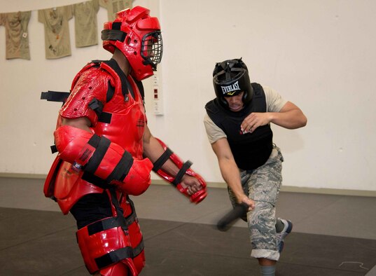 Airman 1st Class Cameron Rogers, right, 86th Security Forces Squadron control center technician, uses a baton to practice defending himself against Staff Sgt. Stephaun Mckinley, 86th SFS alpha assistant flight chief, during training for potential Phoenix Ravens on Ramstein Air Base, Germany, April 27, 2017. Phoenix Ravens, who provide aircraft ground security, train with a variety of weapons because they are sometimes restricted on which weapons they can bring onboard an aircraft. (U.S. Air Force photo by Senior Airman Elizabeth Baker/Released)