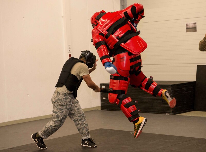 Airman 1st Class Damien Monreal, left, 86th Security Forces Squadron alarm monitor, uses a baton to practice defending himself against Staff Sgt. Stephaun Mckinley, 86th SFS assistant flight chief, on Ramstein Air Base, Germany, April 27, 2017. Two of the five participants of the 86 SFS training qualified to continue on to the Phoenix Raven qualification course on Fort Dix, NJ, where they will learn help detect, deter and counter threats to Air Mobility Command aircraft. (U.S. Air Force photo by Senior Airman Elizabeth Baker/Released)