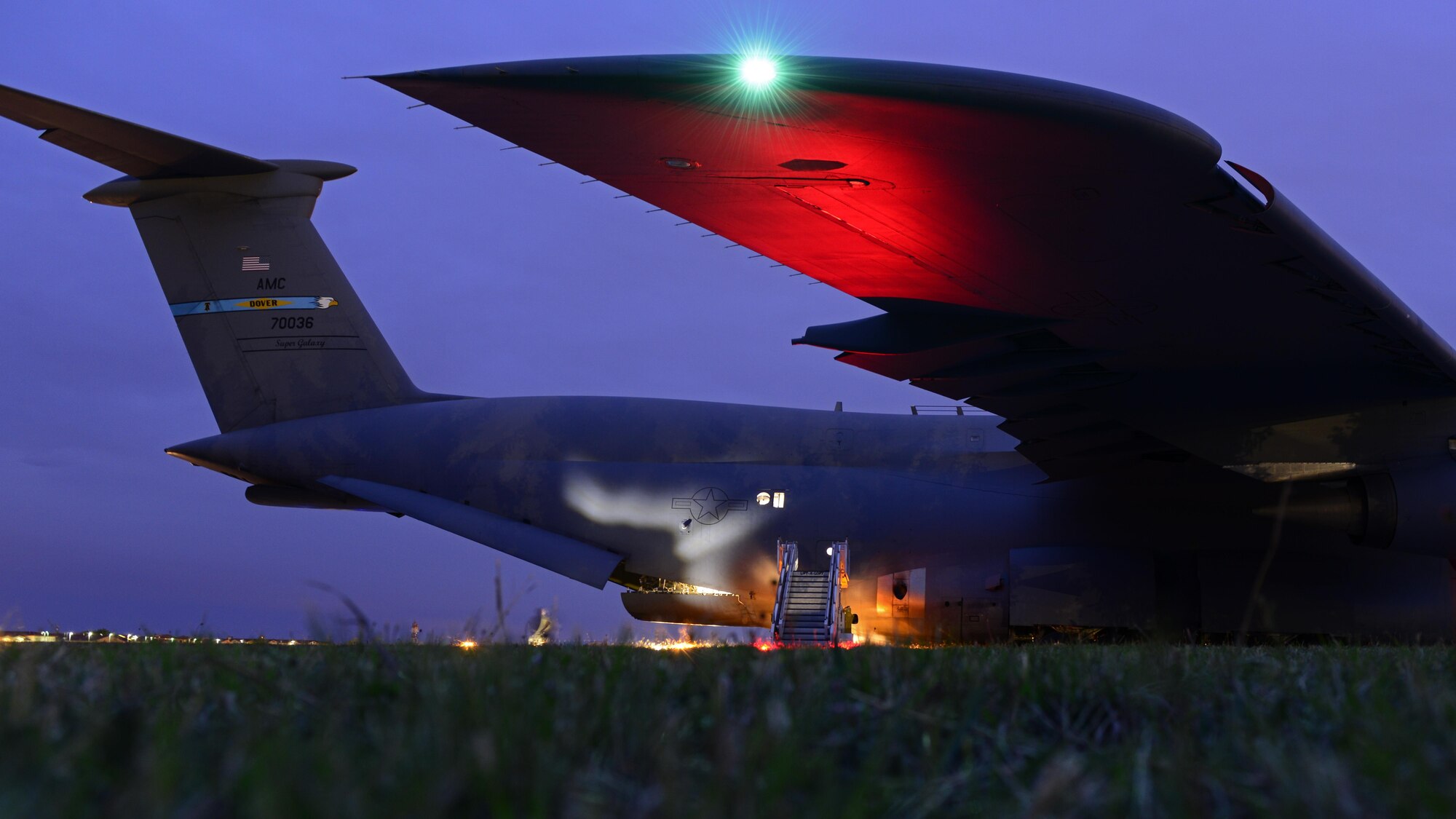 A C-5 Galaxy sits on the runway at Aviano Air Base, Italy, April 19, 2017. The 31st LRS assisted passengers and cargo to deploy on a C-5 Galaxy from Aviano Air Base, Italy, to Bagram Airfield, Afghanistan.  (U.S. Air Force photo by Airman 1st Class Ryan Brooks)