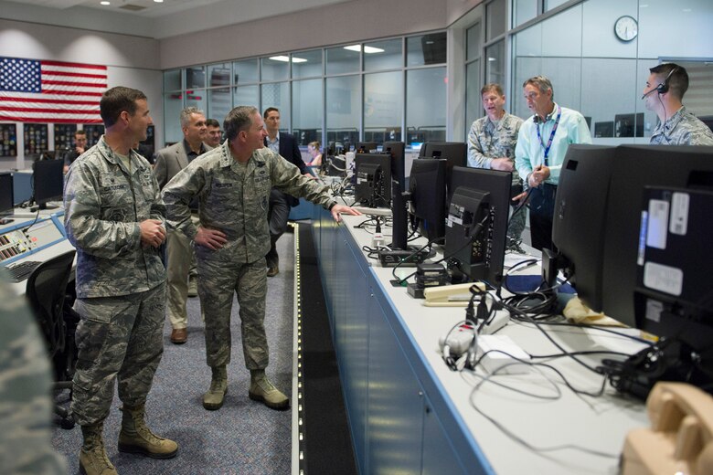 (Center) Air Force Chief of Staff Gen. David L. Goldfein visits with members of the 45th Space Wing launch team April 30, 2017, at Cape Canaveral Air Force Station, Fla. The tour included a visit to the Morrell Operations Center; Cape Canaveral Air Force Station Headquarters; Space Launch Complex 37; Moon Express; and a close up view of the Falcon 9 launch and landing. (U.S. Air Force photo/Matthew Jurgens)