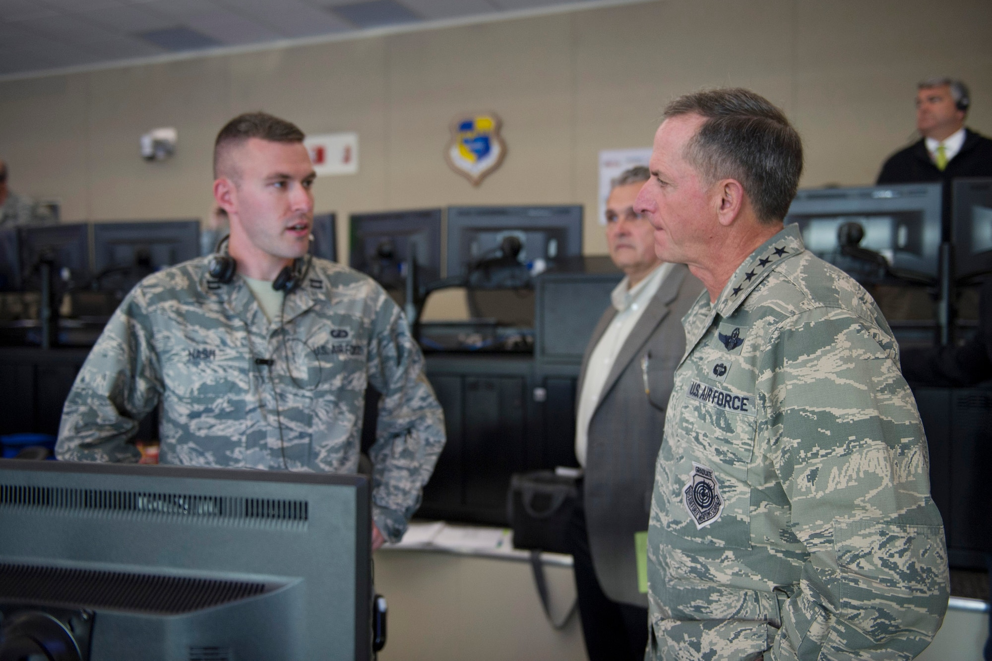 (Right) Air Force Chief of Staff Gen. David L. Goldfein and Capt. Nathan Nash, 45th Launch Support Squadron officer, discuss launch operations at the Multi-Vehicle Launch Support Center, May 1, 2017, at Cape Canaveral Air Force Station, Fla. The 45th Space Wing maintains Eastern Range operations, launch operations, expeditionary and contingency readiness while supporting the base.  (U.S. Air Force photo/Matthew Jurgens)