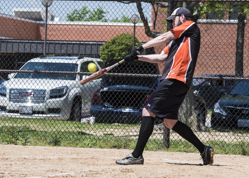 Jacob Wright, Naval Communications Security Material System communication clerk, swings a bat during the “Strike Out Sexual Assault” Softball Tournament at Joint Base Andrews, Md., April 28, 2017.  The competition was held at the close of Sexual Assault Awareness and Prevention Month, the goal of which is to raise cognizance about sexual harassment and violence, and inform military members how to prevent it. SAAPM also hosted a proclamation signing, informational walk and pledge making. (U.S. Air Force photo by Senior Airman Jordyn Fetter)