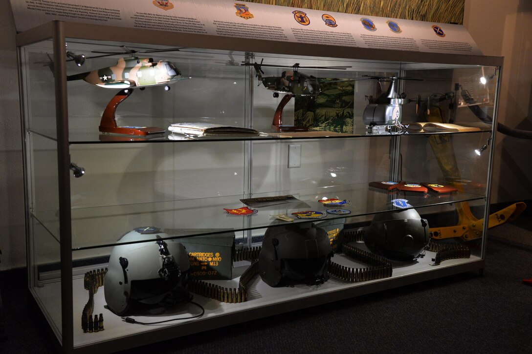 Various models of aircraft, unit patches and aircrew flying helmets are part of a display honoring the 40th Helicopter Squadron in the base museum April 28, 2017, at Malmstrom Air Force Base, Mont. The display is the first helicopter display at the museum and recognizes the relationship between the assigned units as well as the service of 40th aircrew members in support of the nation’s nuclear deterrence mission. (U.S. Air Force photo/Airman 1st Class Daniel Brosam) 