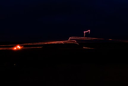 Tracer rounds are seen in the distance as competitors complete a night qualification of the M249 light machine gun at the 2017 Combined Best Warrior Competition, Joint Base McGuire-Dix-Lakehurst, April 26, 2017. The Combined Best Warrior Competition will decide which enlisted soldier and noncommissioned officer will represent the 412th Theater Engineer Command, 416th Engineer Command and 76th Operational Response Command at the United States Army Reserve Command Best Warrior Competition at Fort Bragg, North Carolina in June (U.S. Army Reserve Photo by Spc. Sean Harding/Released).