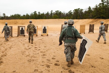 Cadre replace M9 qualification targets at the 2017 Combined Best Warrior Competition, Joint Base McGuire-Dix-Lakehurst, April 26, 2017. The Combined Best Warrior Competition will decide which enlisted soldier and noncommissioned officer will represent the 412th Theater Engineer Command, 416th Engineer Command and 76th Operational Response Command at the United States Army Reserve Command Best Warrior Competition at Fort Bragg, North Carolina in June (U.S. Army Reserve Photo by Spc. Sean Harding/Released).