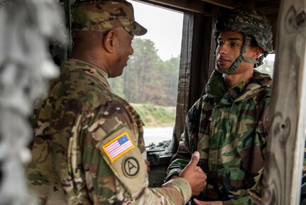 Sgt. 1st Class Vincent Johnson gives Spc. Kyllo Laird-Kyllo-Richard a few words of advice during the 2017 Combined Best Warrior Competition at Joint Base McGuire-Dix-Lakehurst, New Jersey, April 25, 2017. The Combined Best Warrior Competition will decide which enlisted soldier and noncommissioned officer will represent the 412th Theater Engineer Command, 416th Engineer Command and 76th Operational Response Command at the United States Army Reserve Command Best Warrior Competition at Fort Bragg, North Carolina in June (U.S. Army Reserve Photo by Spc. Sean Harding/Released).