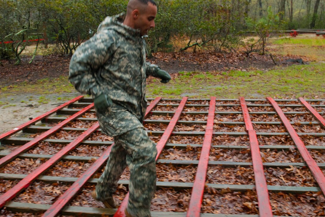 Sgt. Luciano Batista of the 299th Engineer Company, 411th Engineer Brigade, navigates a weave during the obstacle course portion of the 2017 Combined Best Warrior Competition, Joint Base McGuire-Dix-Lakehurst, New Jersey, April 25, 2017. The Combined Best Warrior Competition will decide which enlisted soldier and noncommissioned officer will represent the 412th Theater Engineer Command, 416th Engineer Command and 76th Operational Response Command at the United States Army Reserve Command Best Warrior Competition at Fort Bragg, North Carolina in June (U.S. Army Reserve Photo by Spc. Sean Harding/Released).